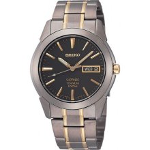 Seiko Men's Two Tone Titanium Quartz Sapphire Charcoal Dial SGG735