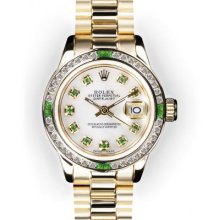 Ladies' Mother of Pearl Dial Emerald Channel Set Bezel Rolex President