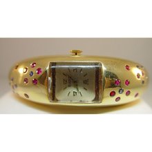 Ladies 14 Karat Yellow Gold ELOGA Watch with Rubies and Sapphires