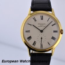 Patek Philippe 18K YG Roman Numerals Signed Tiffany and Co.