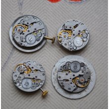 0.7 inch Set of 4 vintage watch movements with dial.