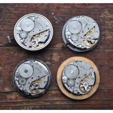 0.9 inch Set of 4 vintage watch movements with dial.