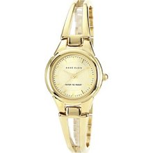 AK Anne Klein Women's 10-9816CHGB Gold-Tone Bangle Watch