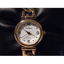 Peugeot Ladies Watch W/gold And Wht Leather Band