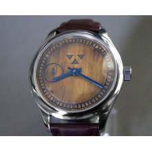 Wristwatch in Stainless Steel with handcrafted Daedalian Dial in oxidized brass