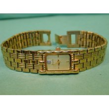 Bulova Ladies One Diamond Dial Gold Tone Wrist Watch