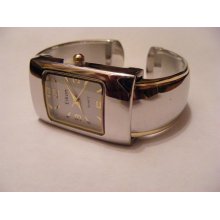 EIKON SILVER WITH GOLD ACCENTS 3/4 INCH METAL CUFF BAND QUARTZ WATCH - Silver - Metal - 14 inches