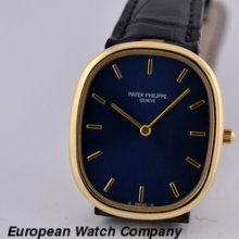 Patek Philippe Ellipse 18K YG Blue Dial W/ Deployant Buckle