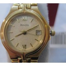 Bulova Ladies Gold Tone Roman Numberals Date Watch 97m02