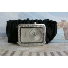 Puffy Black Grosgrain Ribbon with Silver Face Surrounded with Swarovski Crystal Watch