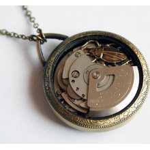 Steampunk Necklace in a Small Pocket Watch Casing Genuine Vintage Automatic Watch Movement and a Small Brass Scarab