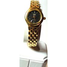 Thin Wrist Watch Petite Q&Q 18k gold plated Onyx dial and is working Medium Wrist