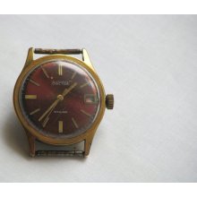 Vintage men's mechanical wrist watch Vostok - Communist USSR accessory from Russian Soviet Union era 1960's