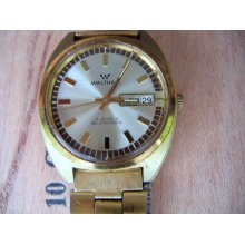 Waltham Swiss Automatic 17 jewel Day/Date gold w/ gold metal Bracelet. runs great