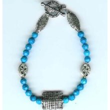 Faceted Turquoise and Bali-Style Sterling Silver Bracelet