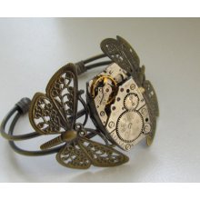 Steampunk Butterfly Watch Bracelet - with vintage watch movement. Industrial chic jewelry