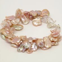 Fresh water pearl with rose quartz faceted briolettes and Morganite faceted double strand bracelet. 12mm to 16mm fresh water pearls and 11mm rose quartz faceted briolettes - 7 Â¼ to 8 Â¼ inch adjustable. Sterling silver clasp. SKU:1985