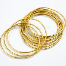 Gold leather bangle with gold tubes, gold bangle bracelet