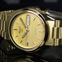 Latest Seiko 5 Automatic Gold Tone Champagne Face Day Date Snxl72k1