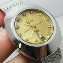 Rare Omax Crystal Automatic Gold Dial Gents Swiss Oval Case With Mesh Band.