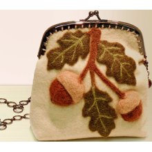 Elegant Acorn Bough wool felt purse with metal frame.