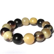 Impressive Small Handcrafted Black, White Horn Ball Charm Bracelet