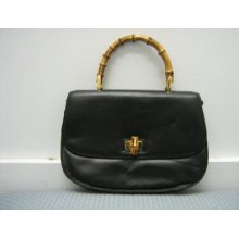 Medallion Black Leather Purse With Bamboo Clutch And Closure