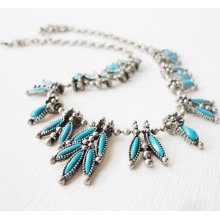 Pewter necklace with simulated needlepoint turquoise