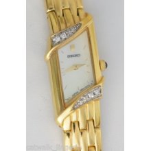 Seiko Woman's 2e20-7399 Gold Tone Watch Diamond Bezel Mother Of Pearl Band