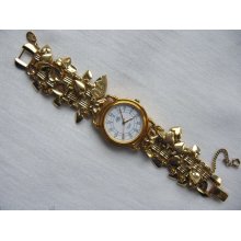 Vintage KIRKS FOLLY Goldtone Hearts & Cherubs Watch