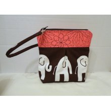 wristlet or clutch in chocolate and pink elephant print with pink floral lining